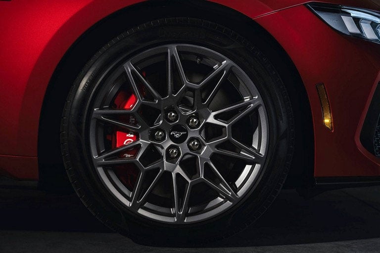 2024 Ford Mustang® model with a close-up of a wheel and brake caliper | Joe Ricci's Ordus Ford, LLC in Bad Axe MI