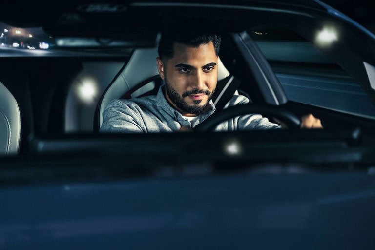 Person sitting in the driver’s seat of a parked 2024 Ford Mustang® coupe | Joe Ricci's Ordus Ford, LLC in Bad Axe MI