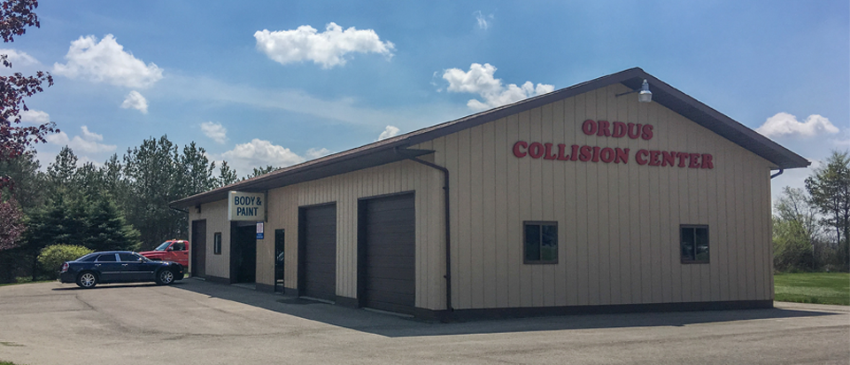 Collision center exterior Joe Ricci's Ordus Ford, LLC in Bad Axe MI